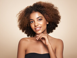Beauty portrait of African American girl with afro hair. Beautiful black woman. Cosmetics, makeup...