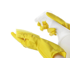 Woman spraying sponge on white background