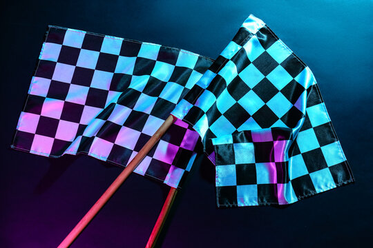 Racing flags on dark background