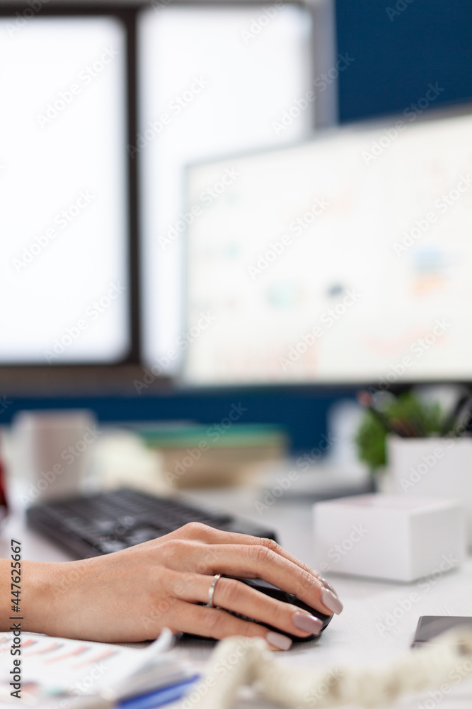 Aufkleber company executive in his office using and clicking on mouse with bluetooth. finger of hand pushing o