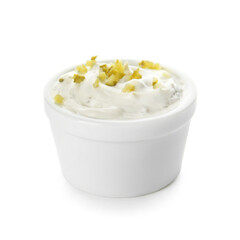 Bowl with tasty tartare sauce on white background