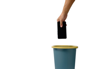 Man hand throws cell phone into trash can on white background.