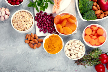 Best products for heart on dark gray background. Clean eating concept.