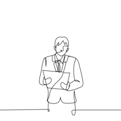 businessman stands with documents - one line drawing. conception: man in business suit holding tablet with papers