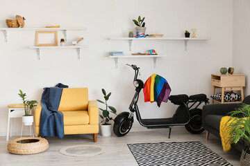 Electric scooter with flag of LGBT in interior of living room