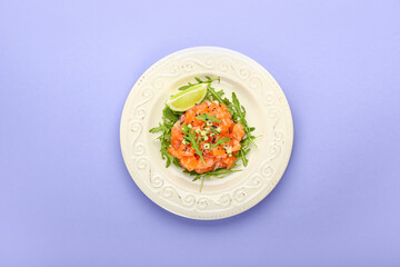 Delicious salmon tartar on color background