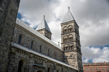 Fototapeta premium Lund Cathedral and bell tower building in central Lund on a summer day, Sweden, south of Lund Cathedral in Skane.