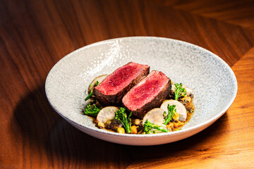 beef steak with vegetables in plate
