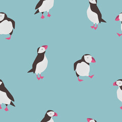 Seamless pattern with cute puffins in different poses