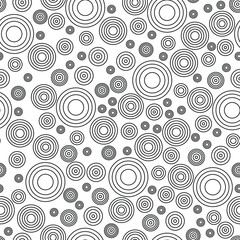 Seamless pattern. Concentric circles of different sizes on a white background. Minimalism geometric pattern