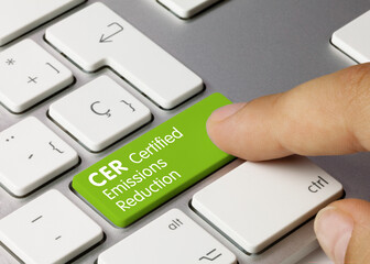 CER Certified emissions reduction - Inscription on Green Keyboard Key.