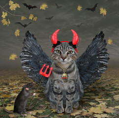 A gray cat with bird wings and red horns is near a rat with a devil trident in the fall forest for...