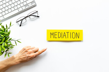 Conflict resolved concept. Mediation word on sticky notes on office table