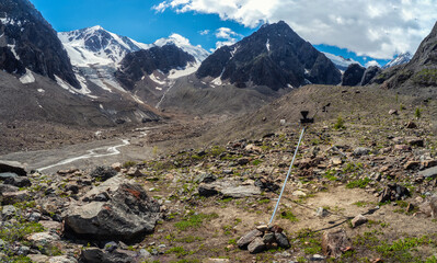Fototapeta na wymiar Geodesic sign on the mountain. Amazing Altai Mountains. The way to the Bolshoy Aktru Glacier.