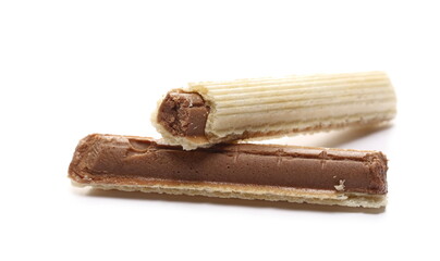 Round wafer stick with chocolate filling broken in half isolated on white background