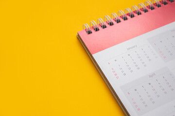 calendar page on yellow background business planning appointment meeting concept