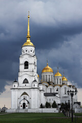 Fototapeta na wymiar Russia, Vladimir, June 2021: Bell tower of the Assumption Cathedral in Vladimir in cloudy weather.