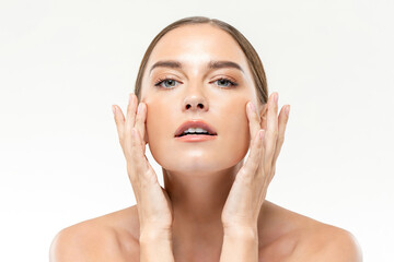 Smooth fresh glowing skin woman touching her face in white isolated studio background for beauty and skincare concepts