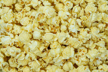Buttered popcorn in a large cup