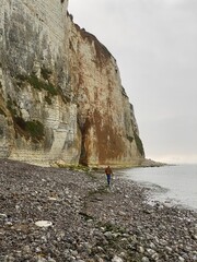 Veulettes-sur-Mer, France, August 16, 2020 - Unrecognizable people taking a walk close to the dangerous cliff of the opal coast