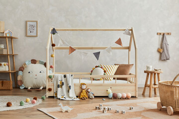 Stylish composition of cozy scandinavian child's room interior with wooden bed and coffee table,...