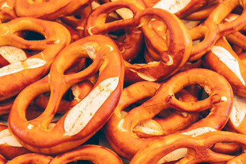 Freshly baked rustic Italian bagels at a Sunday food market in Italy