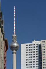 TV tower on Alexanderplatz in Berlin between the houses 