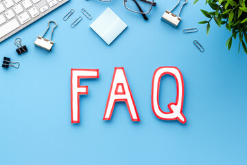 Information helpdesk concept with faq frequently asked questions text on working place