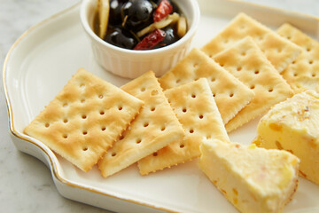 Marinated Olives with Crackers and Cheese