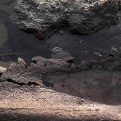 Between a rock and sheet metal