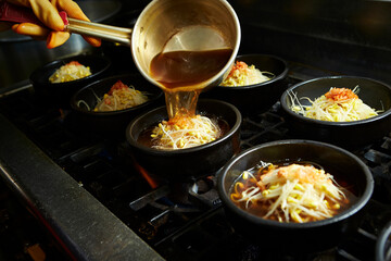 Add broth to boiling pot