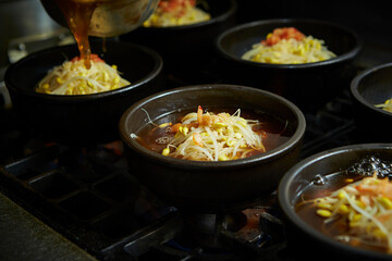 Boiling soup in a pot