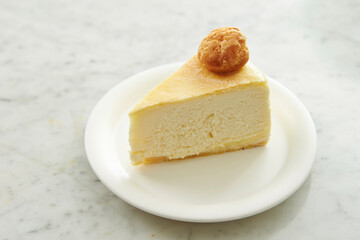 A slice of cheesecake on a plate