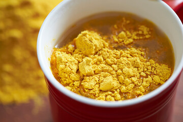 yellow powder drink in cup