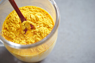 Milk and powder mix in a glass cup