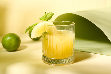 Glass of delicious mai tai cocktail on color background