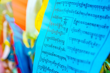 Multicolored Tibetan prayer flags. A symbol of good luck, prosperity and happiness. Traditional...