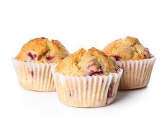 Tasty raspberry muffins on white background