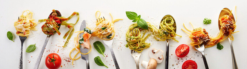 Silverware with spaghetti and various ingredients