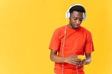 african man wearing headphones technology music entertainment