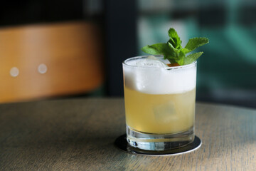 Refreshing citrus cocktail with egg white foam