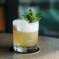 Refreshing citrus cocktail with egg white foam