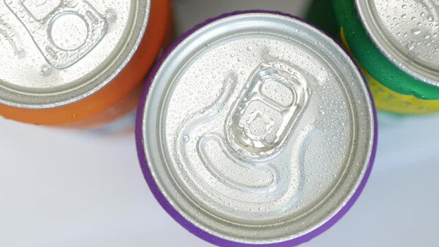Shooting with Refreshing Pop Can Drinks. Various Cold, Sweet, and Carbonated Refreshing Drinks. 