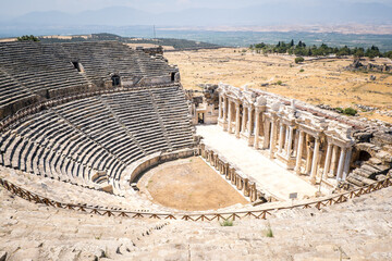 The ancient city of Hierapolis in Pamukkale. The ancient theater of Hierapolis, thousands of years...