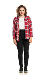 Young woman standing in studio, isolated on white background. 