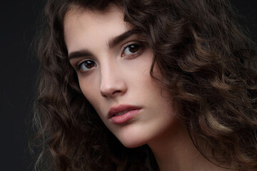 Fototapeta premium Portrait of a beautiful girl close-up