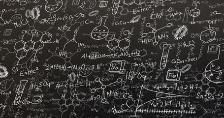 Image of white structural formulae of chemical compounds on blackboard