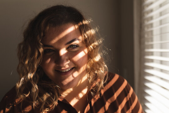 Portrait of caucasian woman smiling and looking at camera