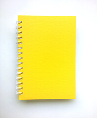 Yellow book on white background..