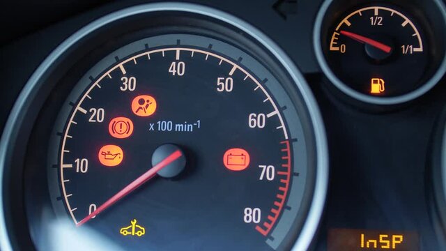 Turning the ignition key. Check the vehicle's systems before starting the engine.